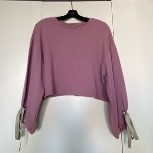 Pink long sleeve top with ribbon detail